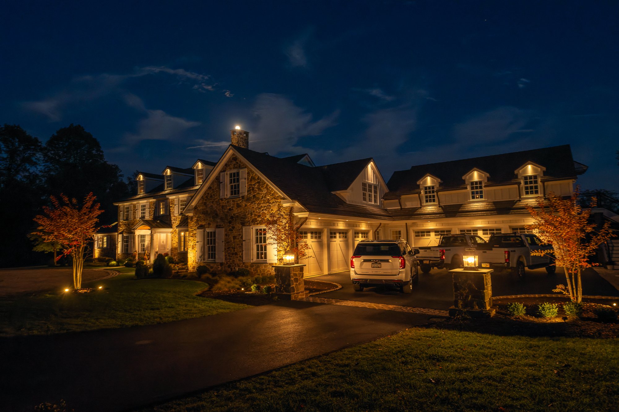 Landscape lighting by JHL in Newtown Square, PA after dark